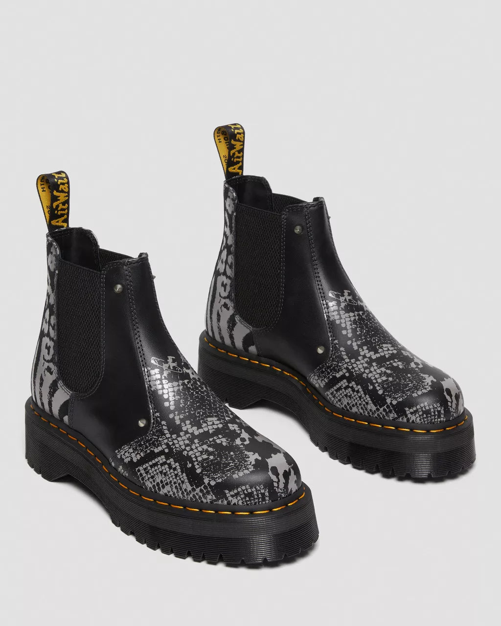 DR MARTENS 2976 Quad Platform Animal Print Boots